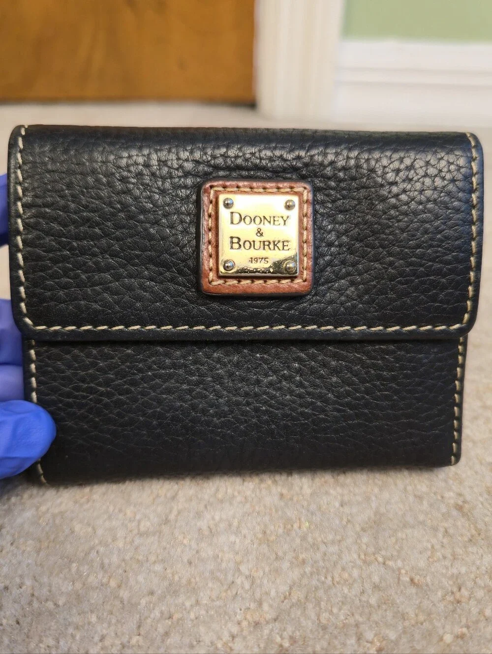 Dooney & Bourke Pebble Grain Leather Small Flap Wallet / Black / 4” x 4.5”